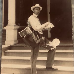 Two antique very unique postcards, rare post man and cat